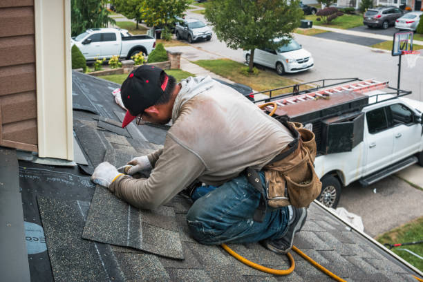 Professional Roofing technician working in Grass Valley, OR